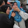 Rescuers search for survivors of Indonesian boat sinking