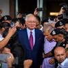 Police summon former Malaysian PM again to record statements
