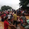 Hundreds missing after hydropower dam collapses in southeast Laos