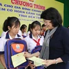 Vice President presents gifts to disadvantaged families, children
