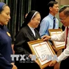 HCM City honours exemplary Catholics in charity work