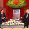 Laos vows to work with Vietnam to enhance bilateral ties