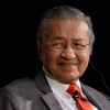 Malaysian PM promises to hand power after two years