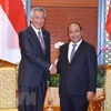 WEF ASEAN 2018: PM Nguyen Xuan Phuc welcomes Singaporean counterpart