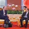 PM urges Carlsberg to expand investment in Vietnam 