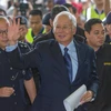 Malaysian former PM summoned to parliament over 1MDB