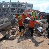 Indonesia: quake-tsunami death toll reaches 1,407