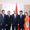PM urges Vietnamese expatriates in Europe to promote solidarity