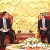 Party official receives Japanese professor, ambassador