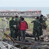 Indonesian rescuers use drones as tsunami death toll rises