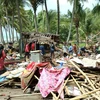Indonesian villagers return home after tsunami