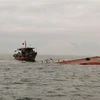 Crew of capsized fishing boat rescued at sea