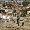 Indonesia speeds up construction of temporary houses for tsunami victims