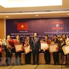 Vietnam, Laos discuss boosting labour, social welfare cooperation 
