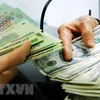 Reference exchange rate goes down by 3 VND on June 25