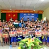 Lifebuoys designed like schoolbags presented to An Giang students