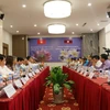 Vietnam, Laos boost cooperation in trade-industry, energy, mining