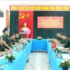 Vietnamese, Lao military courts step up experience exchange 