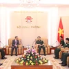 Defence minister hosts outgoing Lao ambassador