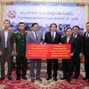 Vietnamese community in Laos donate for flood victims 