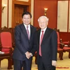 Top leader welcomes Lao PM in Hanoi