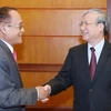 Party official receives Cambodian guest 