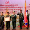 Vietnam confers Gold Star Order on Lao People’s Army 