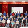 160 wheelchairs presented to Hanoi disabled 