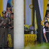 Thai clerk charged with murder after shooting gunman in court