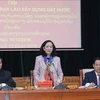 Mass mobilisation official hosts Lao guest 