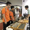 Int’l machinery, supporting industry fairs open in HCM City