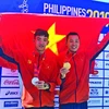 After SEA Games, swimmer Tran Tan Trieu hits open waters