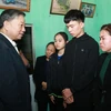 Minister visits families of police officers died in disturbance in Dong Tam