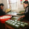 Time for Tet means it's time for a bite of banh chung