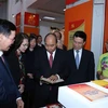 PM visits book exhibition marking Party’s founding anniversary
