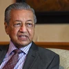 Malaysia’s interim PM proposes forming unity government