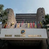 Malaysia lowers key interest rate to support economic growth