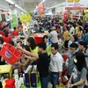 Sales at supermarkets surge, wet markets drop