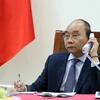 PM Nguyen Xuan Phuc holds phone talks with Japanese counterpart