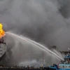 Fire breaks out on oil tanker at Indonesian port