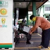 ‘Rice ATMs’ provide staple for struggling Indonesians amid COVID-19