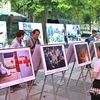 Photo exhibition highlights daily life during COVID-19