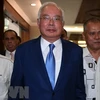 Malaysian court finds ex-PM guilty of corruption 