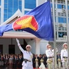 Lao holds flag-raising ceremony to mark ASEAN 53rd anniversary