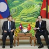 Fatherland Front leader receives Lao counterpart