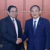 Party official meets Japanese PM 