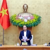 Prime Minister Nguyen Xuan Phuc speaks at the meeting (Source: VNA)
