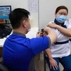 Singapore begins COVID-19 vaccination for health workers