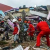 Indonesia: heavy rains hamper rescue of quake victims 