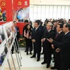 Photo exhibition held to celebrate 13th National Party Congress